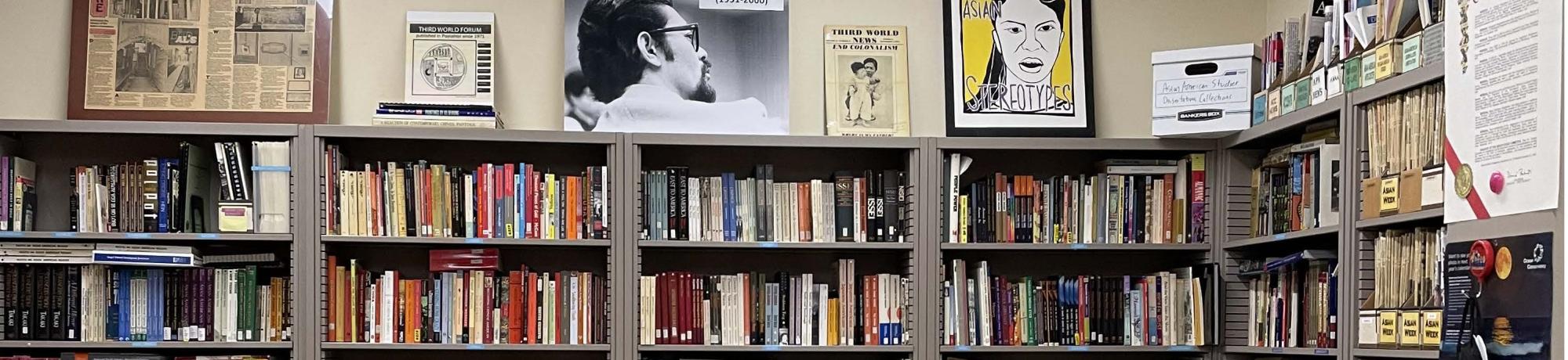 George Kagiwada library bookshelves and posters